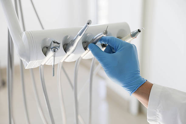Professional Tooth Extraction technician working in Tonganoxie, KS